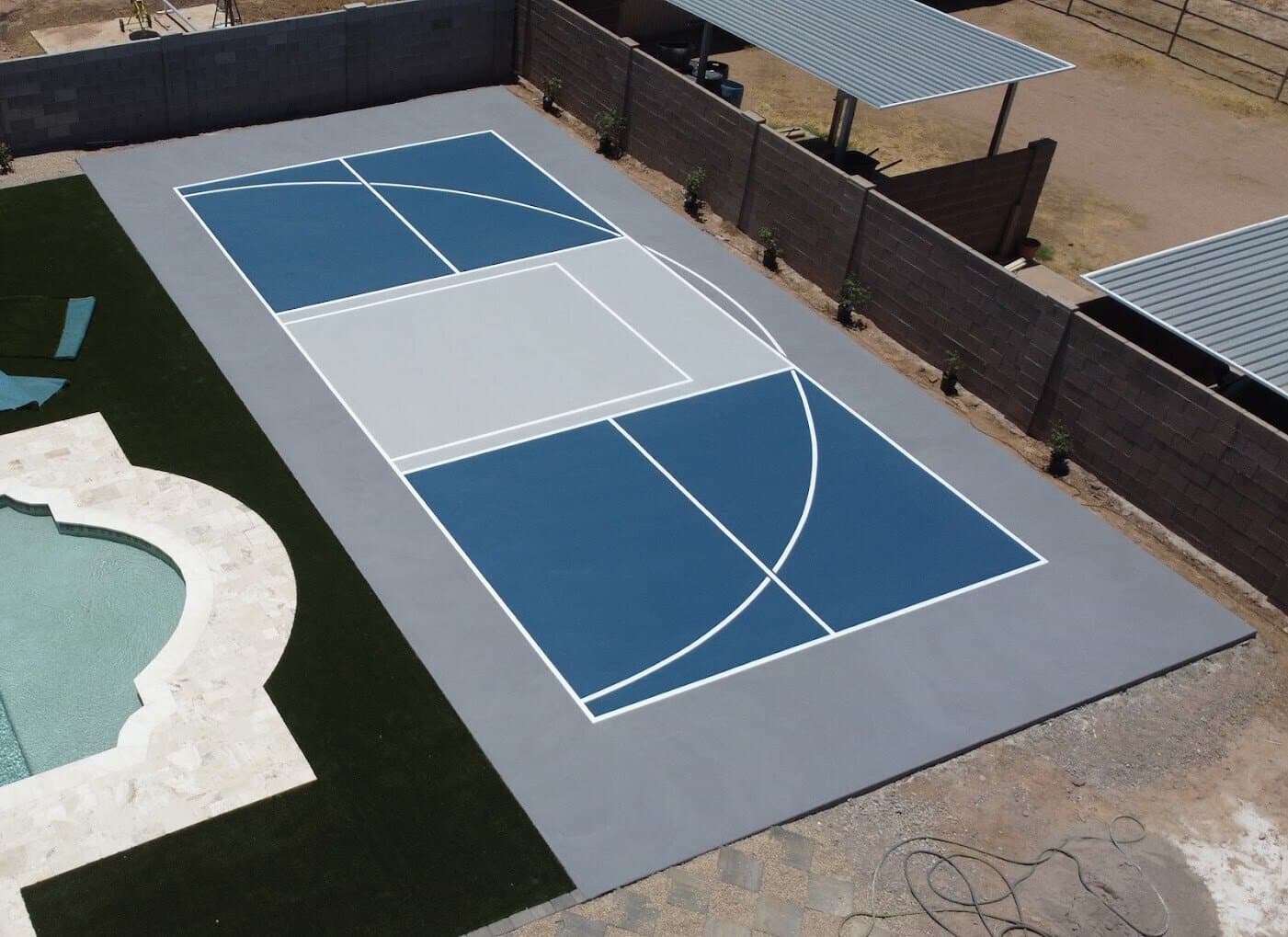 Custom backyard pickleball and basketball court installation in the Greater Phoenix Area